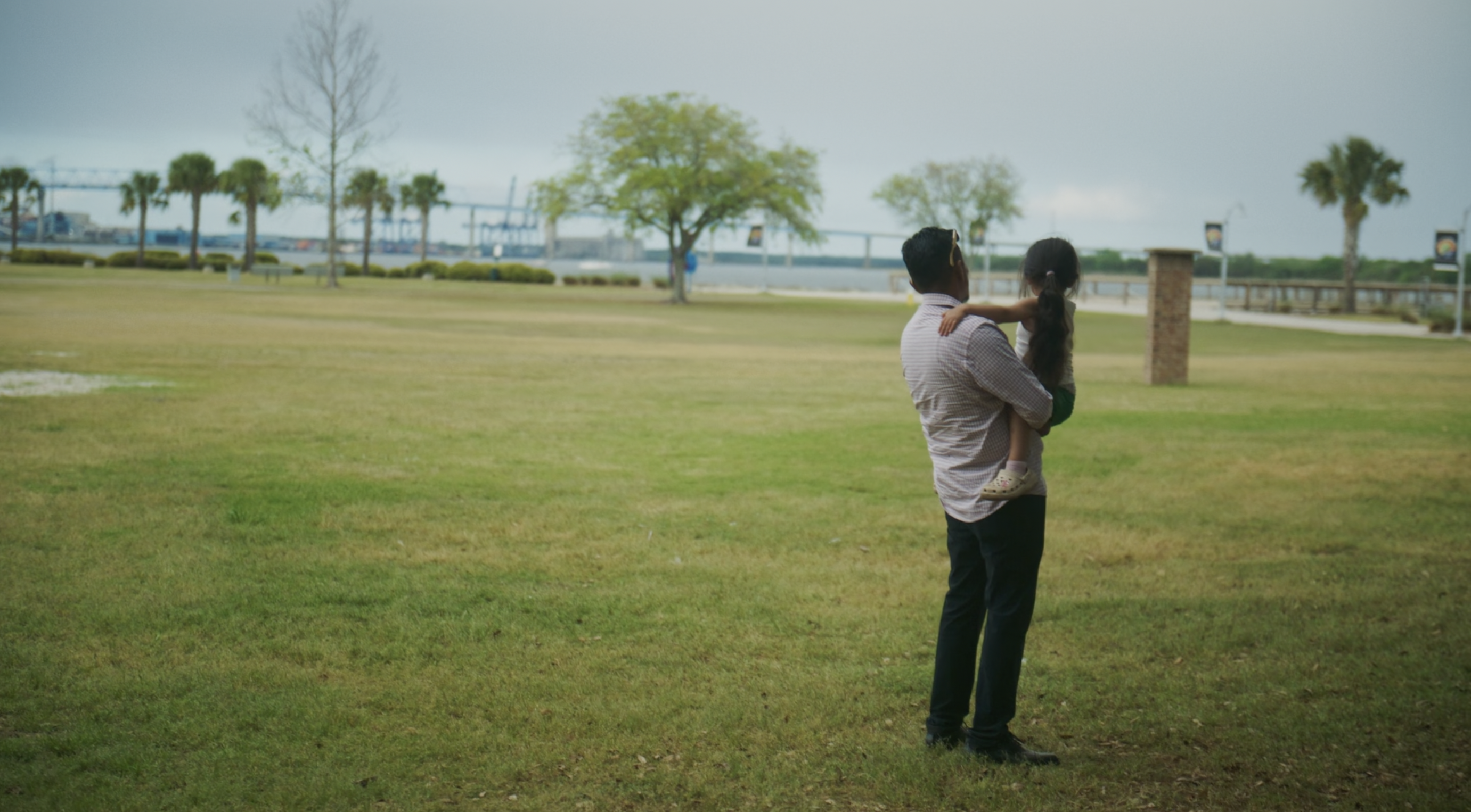 Client with child, from video produced for Charleston Legal Access